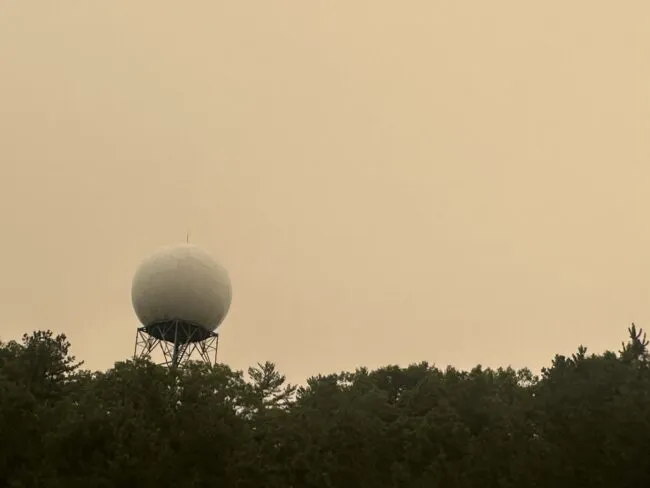 National Weather Service office with the sky obscured by a thick layer of smoke
