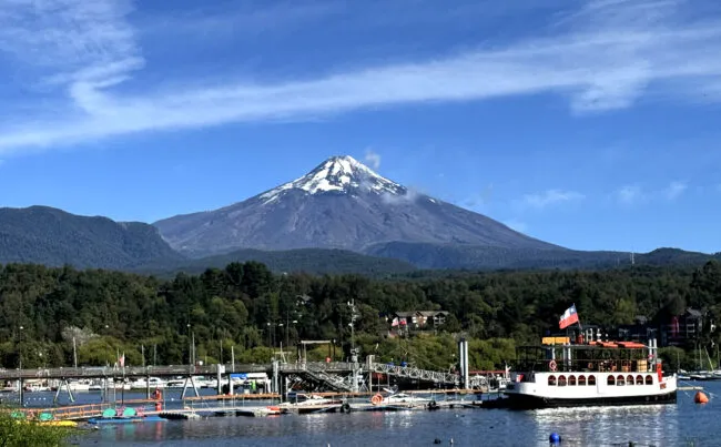 Villarrica volcano rises above the tourist town of Pucón, situated on Lake Villarrica. Photo by Einat Lev.
