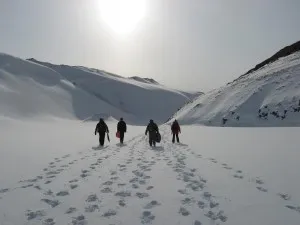 On a "hard" down day where there is no access to the plane, many of the ground and flight crew head to the ice front near Thule for some sledding.