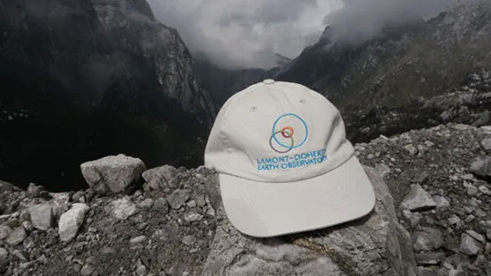 My Lamont-Doherty Earth Observatory hat--which I always try to wear--at the edge of the Grasberg mining area. Meren and Carstenz glaciers (covered by fog) in background.
