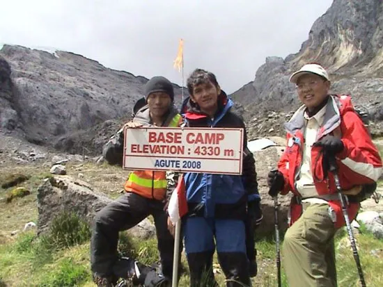 Base camp, elevation 4330 meters. On my left, two technicians who will install an automatic weather station there. Tip of the Meren glacier (East Northwall Firn) can be seen in the top left. We plan to drill three locations there. Base camp, elevatio