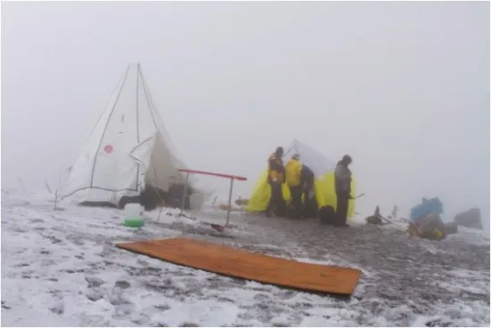 By midmorning nearly every day, fog socks in the drill--then, in midafternoon, fearsome lightning storms regularly move in. Thus, for safety, we evacuate the site every day at 2pm.