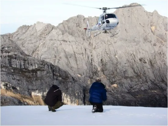 Cores are stored in freezer boxes onsite, then slung by helicopter down the mountain.