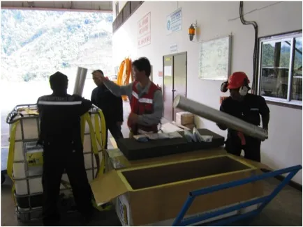 The first cores arrive in the town of Tembagapura, and are loaded into insulated boxes, lined inside with frozen cold packs.
