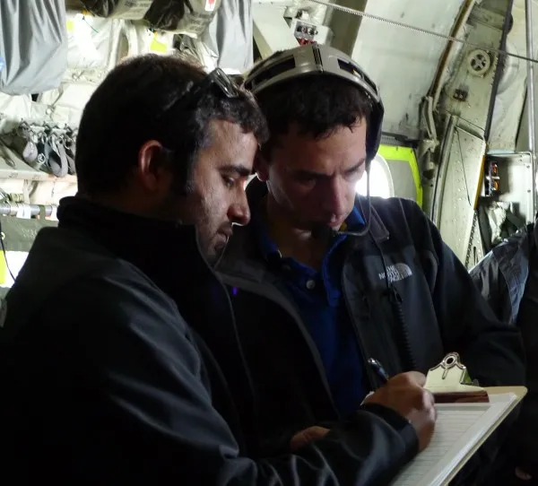 Tej Dhakal and Chris Bertinato confer over the radar data. (photo M. Turrin)