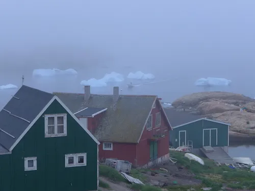 The local coastline has been steeped in fog which prevents helicopters from flying the Upernavik to Kullorsuaq leg. (Photo M. Turrin)