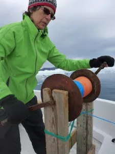 M. Turrin uses the manual winch to lower the CTD. (Photo D. Porter)