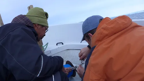 Magnus and Dave work on improving the CTD connection to the.  (Photo M. Turrin)