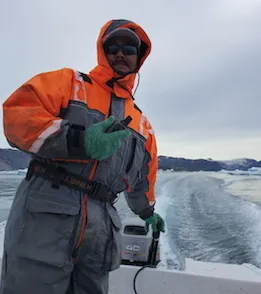 Gabriel Petersen navigates through the ice with the GPS (Photo M. Turrin)