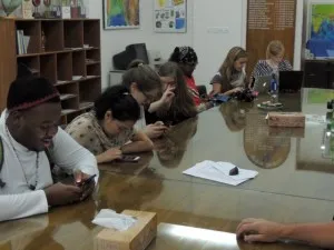 The students catch up on texts and e-mails at Dhaka University after 2 days without a connection