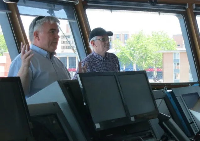 Sean Higgins and Lamont Director Sean Solomon talk from the bridge of the Langseth.
