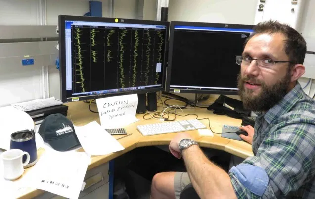 Steve Barker's computer used for correlations comes with a warning: "Caution: exercise extreme patience." Photo: Sidney Hemming