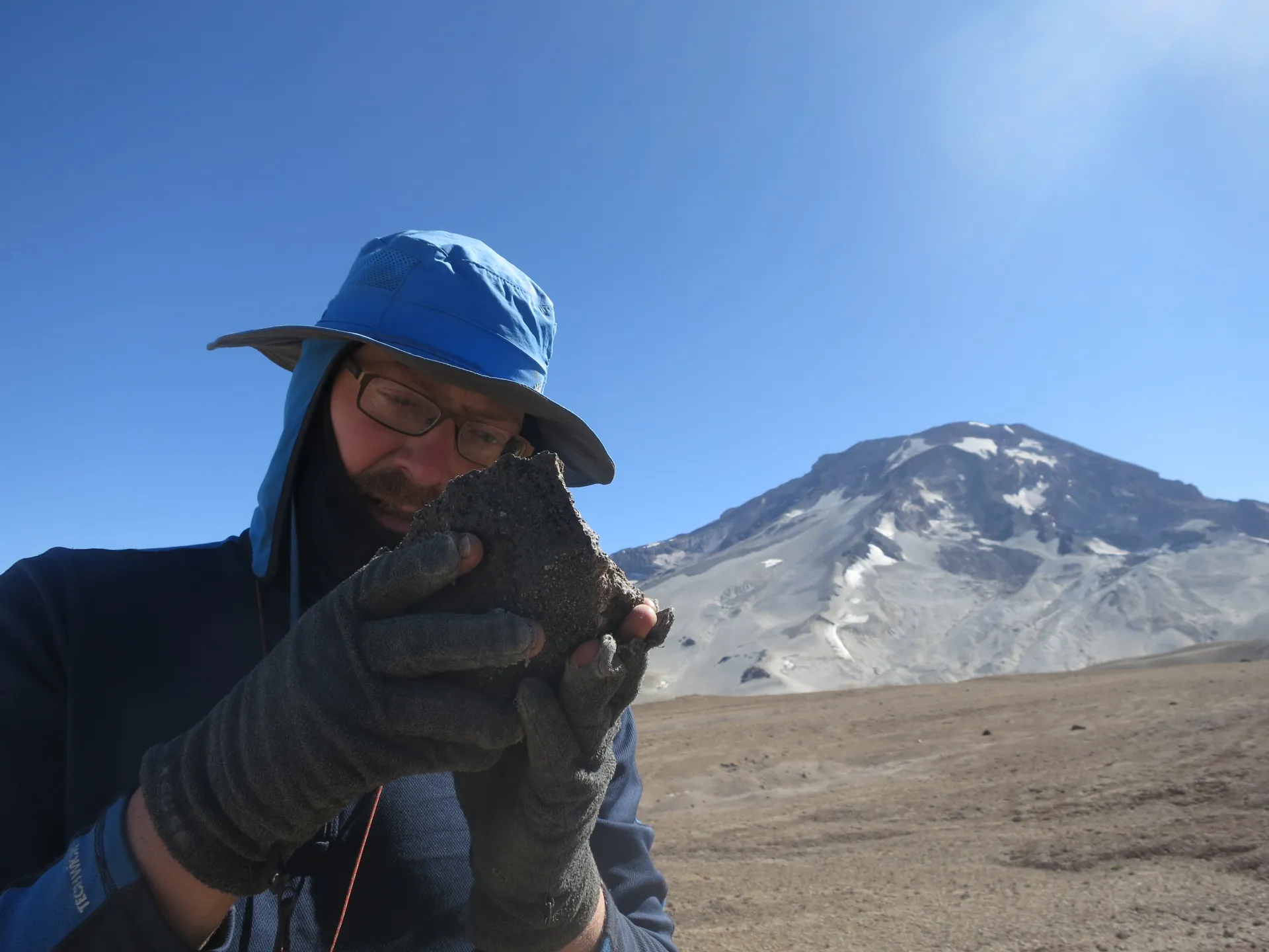walking in the shadow of a great volcano