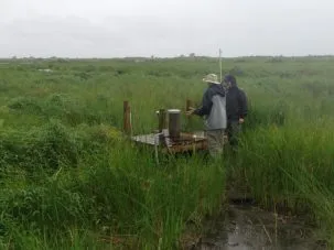 Tim and Keith examining Well 3, the shallowest well.