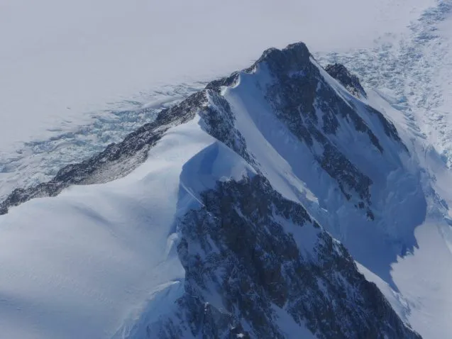 The Antarctic Peninsula has elevation rising 8000 ft. with ice covering the tops of the mountains in thick layers. (Photo M. Turrin) 
