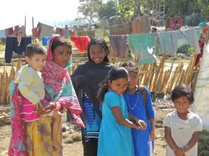 A group of girls excited by the strange visitors to their village asked me to take their picture.