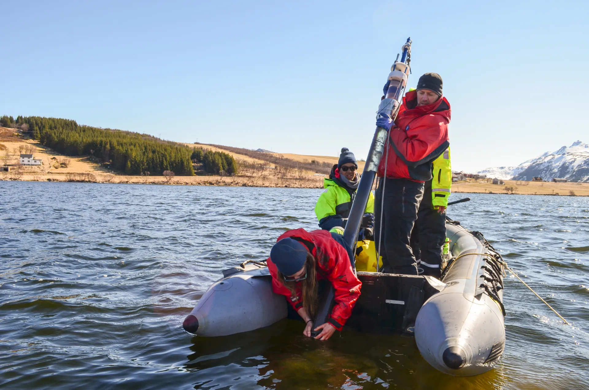 Hauling up a filled core--cold, hard work in water that can be over 100 feet deep. 