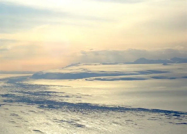 Antarctic Ice showing crevassing along the edges of flow. photo J. Spergle
