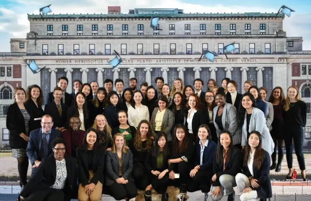 students with columbia backdrop