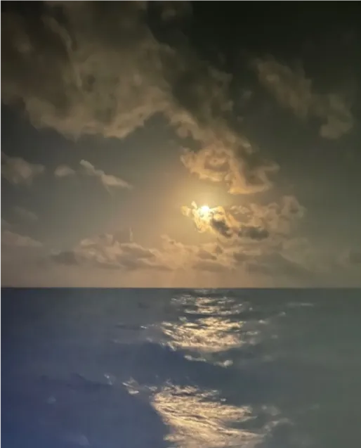 Storm moon and rough seas along the Jamaica Passage.